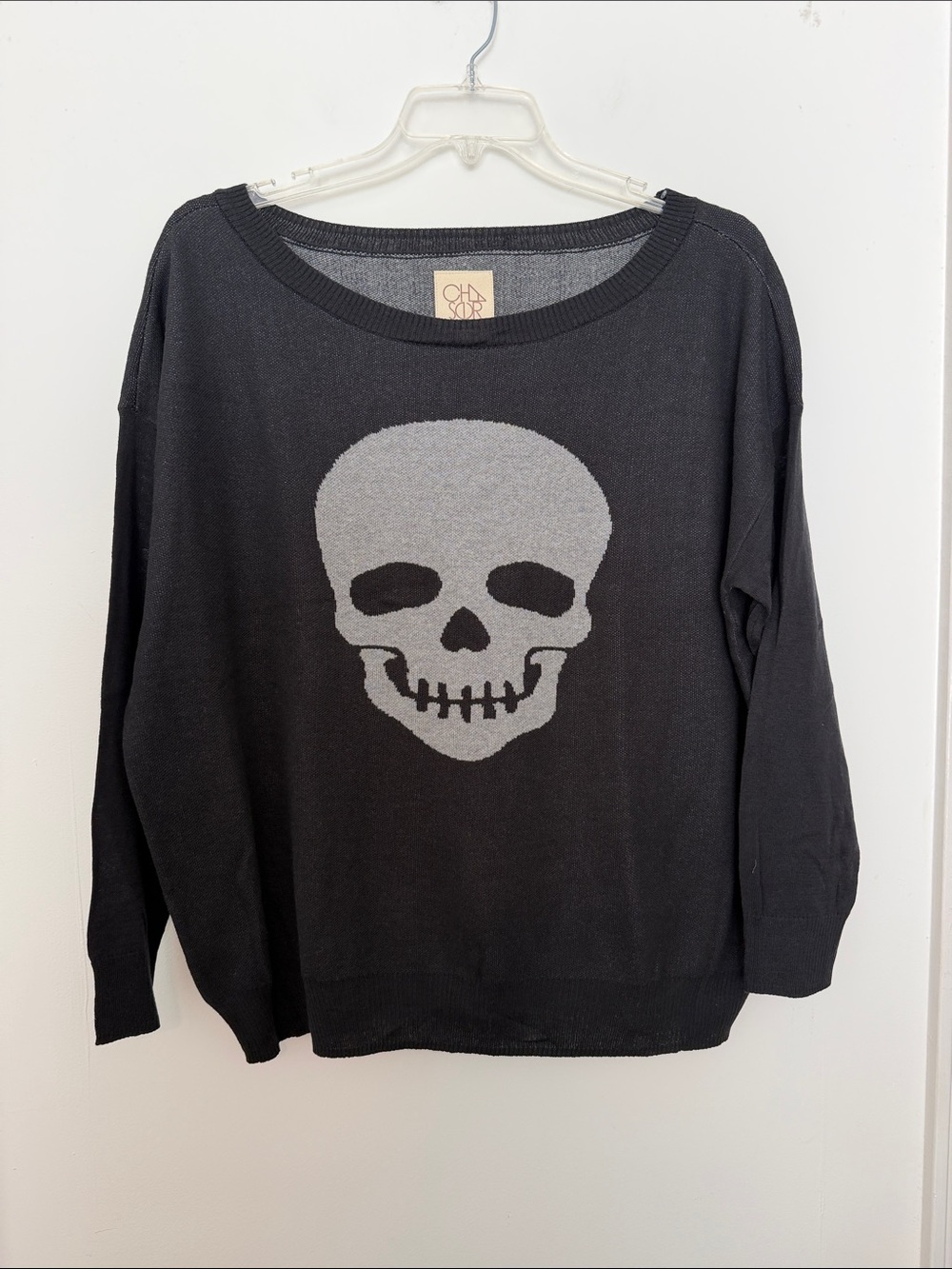 Chaser Black Off-the-Shoulder Skull Sweater with Gray Skull